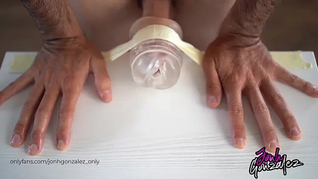 Solo male moans as huge dick cums in transparent Fleshlight