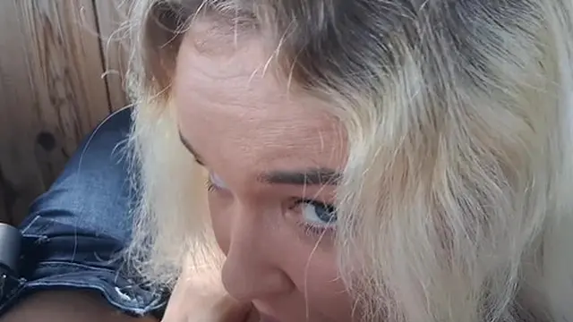 Unplanned public blowjob on a forest viewing deck &mdash;  ending with a huge facial amid yellow blooms