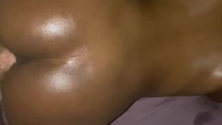 Oiled up Ebony rides me doggy style