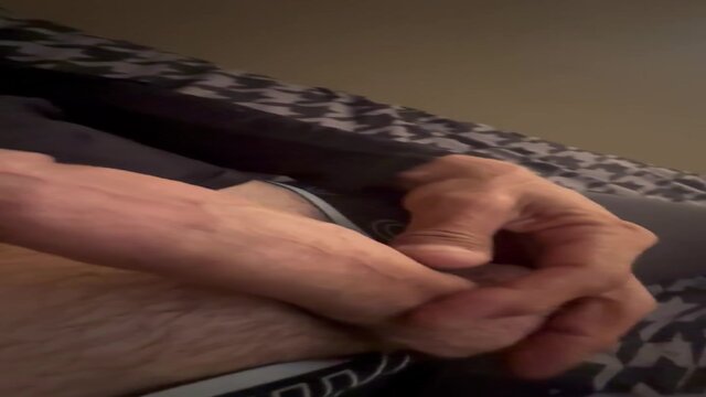 Lucky guy strokes his stiff shaft in her bed for a satisfying solo orgasm