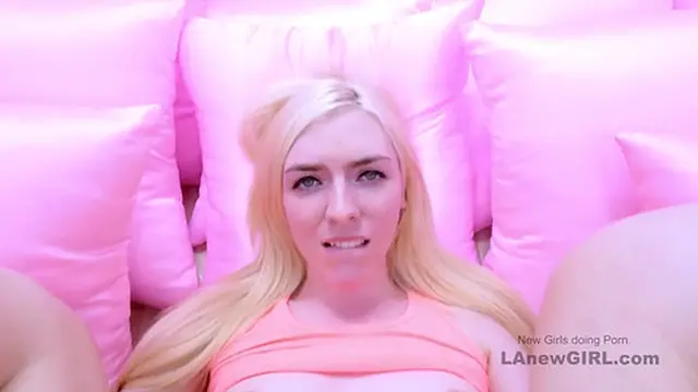 Blonde beauty seduces during a steamy photoshoot